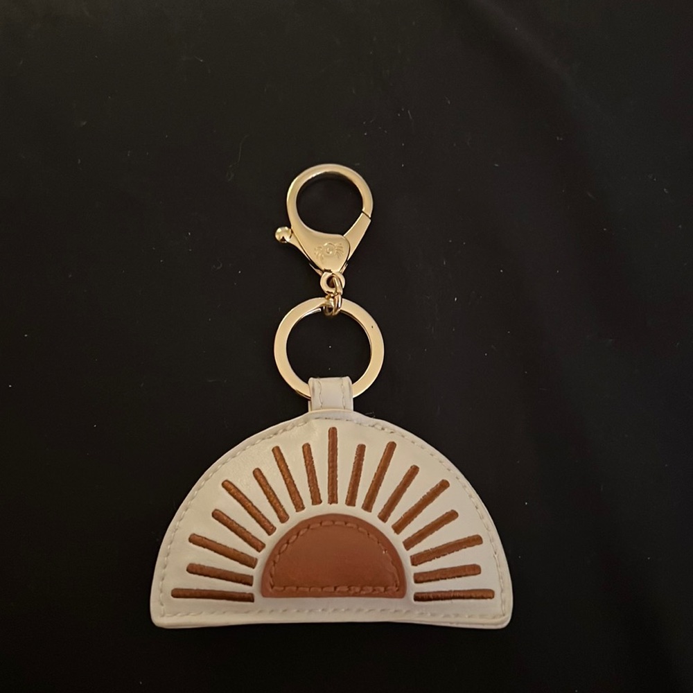 Itzy ritzy terracotta sun puffy charm